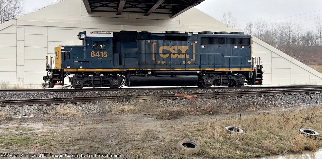 CSX 6415 under Evans Ave. bridge.